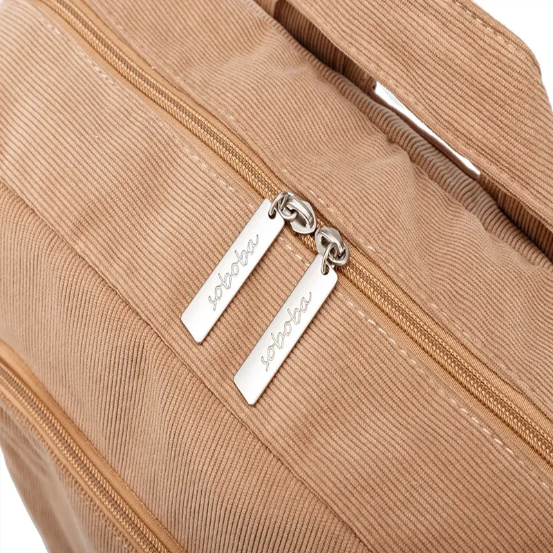 Sac à dos à langer effet velours marron