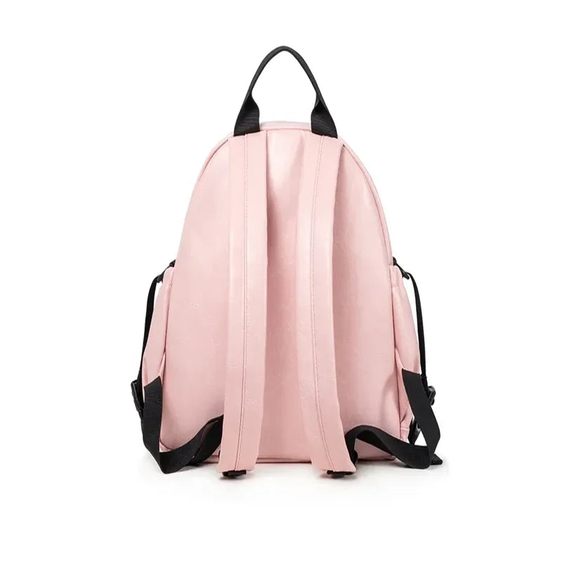 Sac à dos à langer effet cuir rose